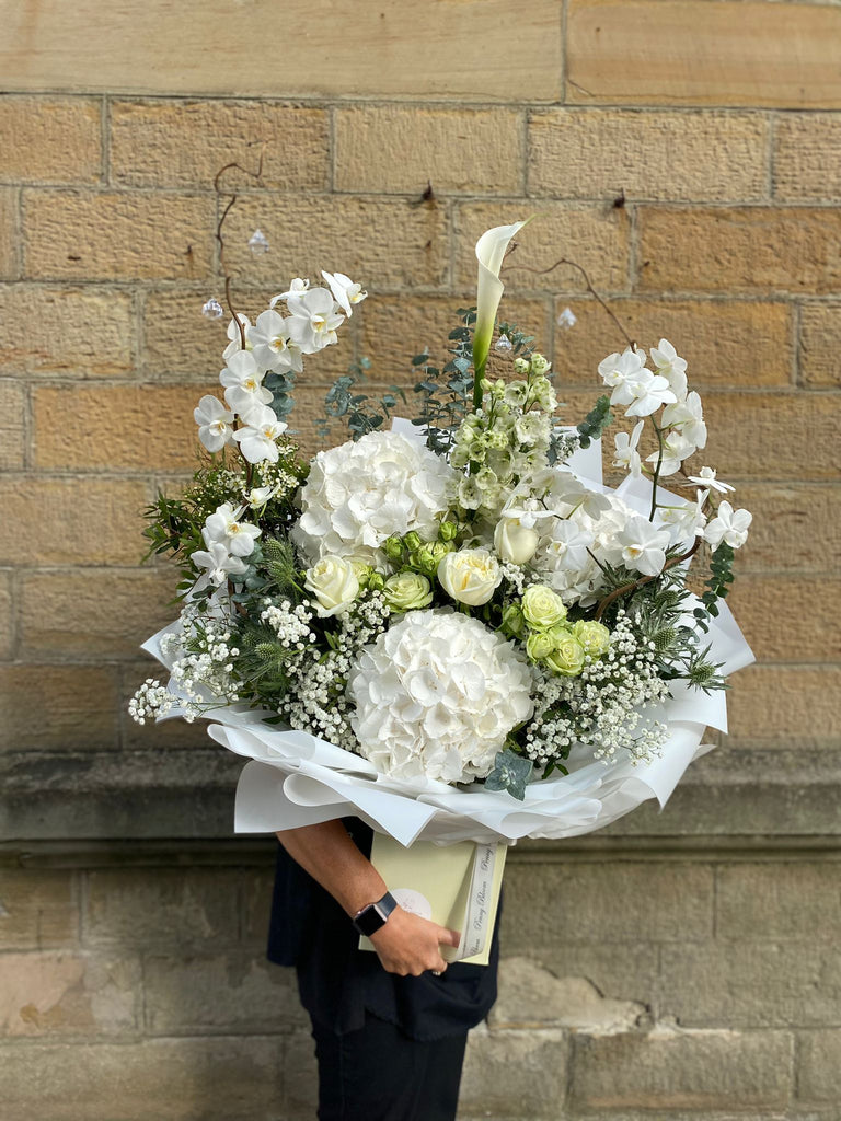 Luxury all white floral bespoke bouquet