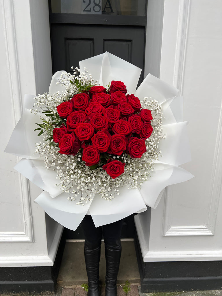 luxury red rose bouquet with gypsophilia