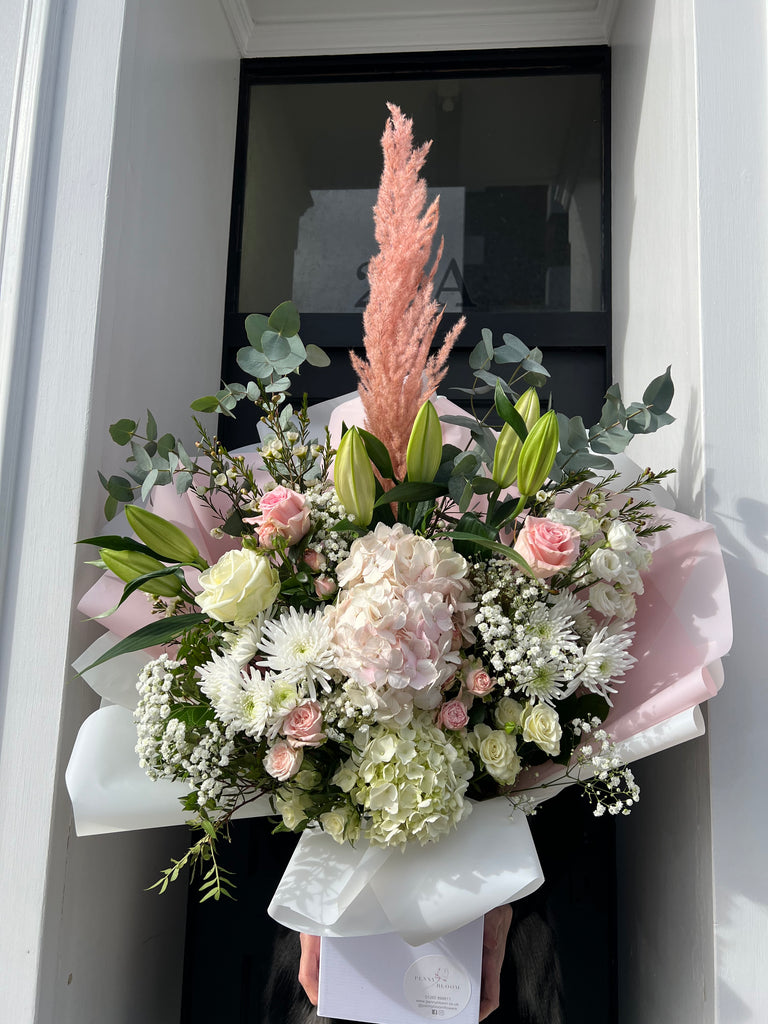 pink and white huge luxury bouquet with pink pampas grass