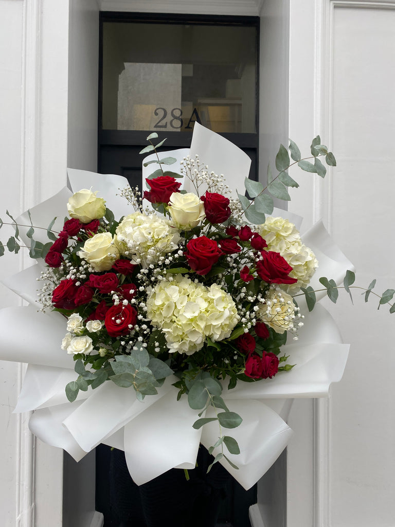 luxury penny bloom red and white flower bouquet