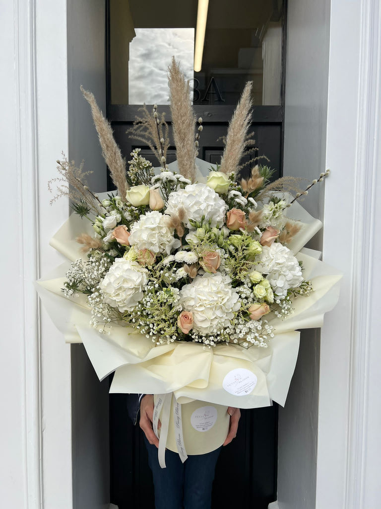 Molly Mae loved white and nude floral bouquet